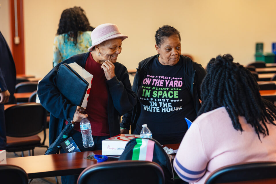 three women in conversation